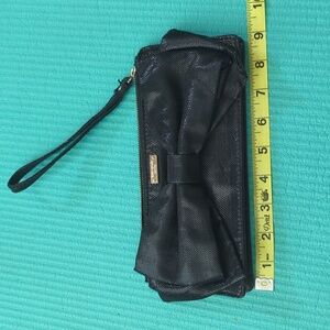 Kate Spade metallic bow wristlet/clutch